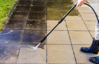 picture of patio slabs being jet washed